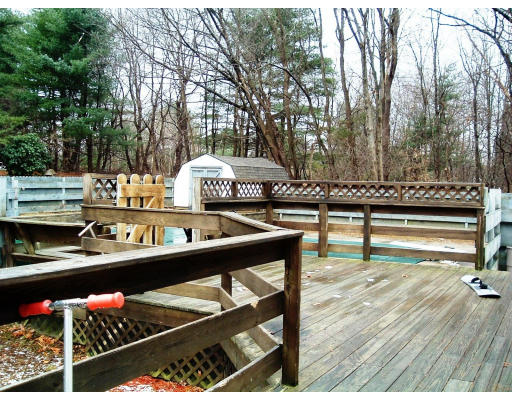 59 Middle Road Amesbury, MA 01913 - Photo 3 of 11 a view of a chairs and tables on the deck