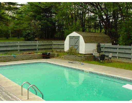 59 Middle Road Amesbury, MA 01913 - Photo 4 of 11 a view of a swimming pool with a garden