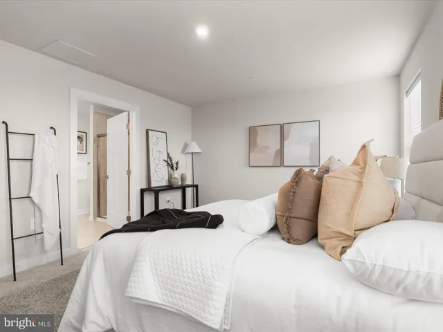 a bathroom with double sink and a mirror