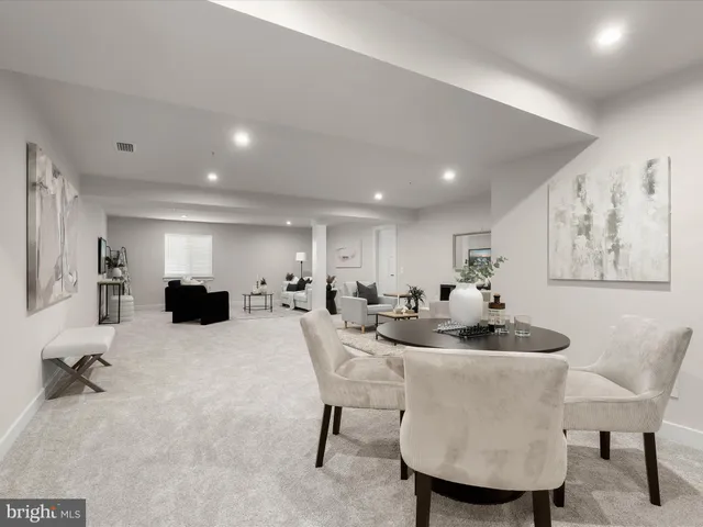 a bath tub sitting next to a shower