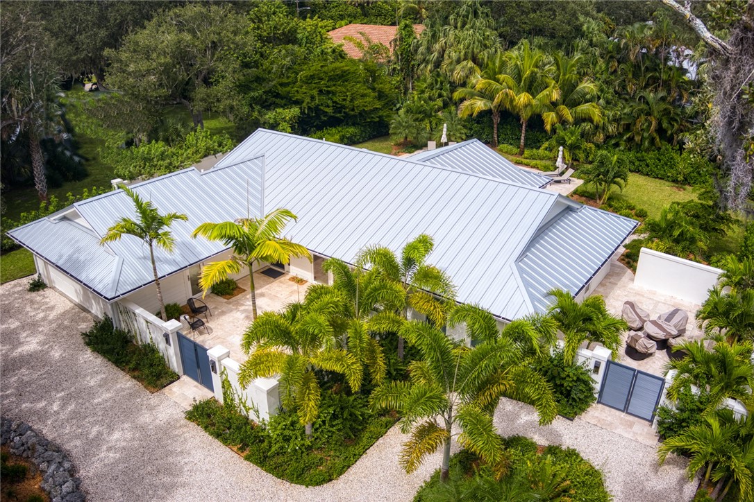 a view of a swimming pool with a yard