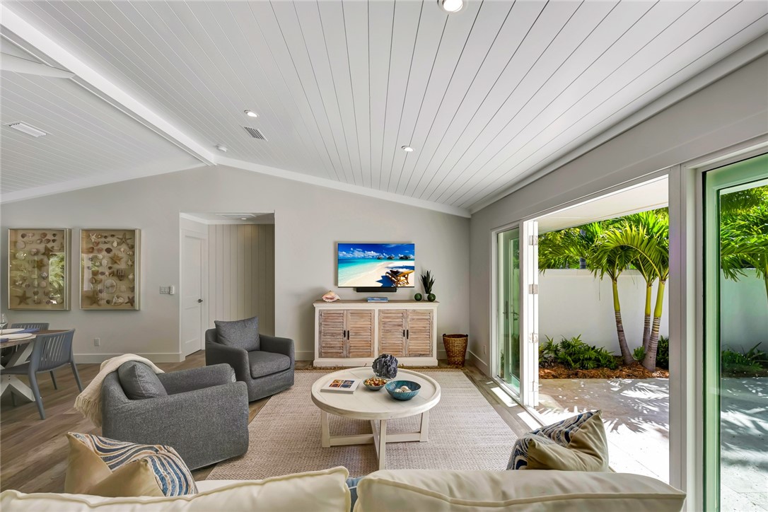 525 Banyan Road Vero Beach, FL 32963 - Photo 9 of 36 a living room with furniture and a large window