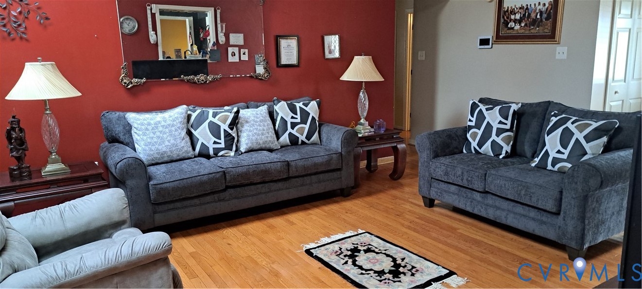 10401 Hamlin Place Chester, VA 23831 - Photo 8 of 19 Living area featuring wood finished floors