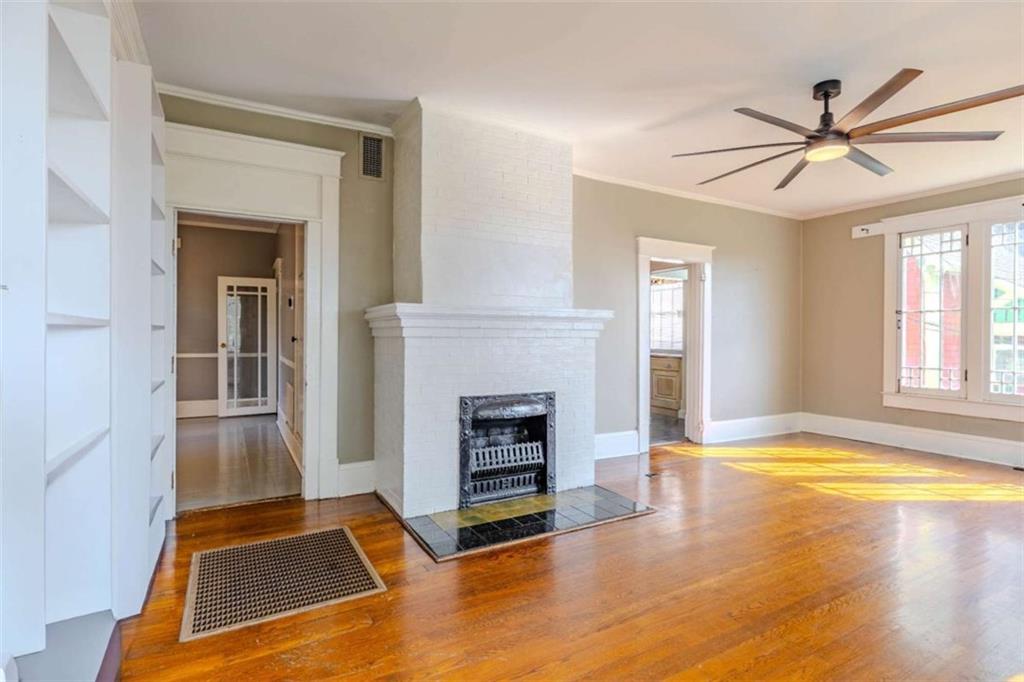 214 East 3rd Street Rome, GA 30161 - Photo 18 of 33 a view of a livingroom with a fireplace and window