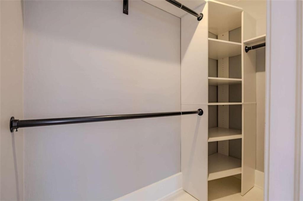 214 East 3rd Street Rome, GA 30161 - Photo 31 of 33 a view of walk in closet with empty racks