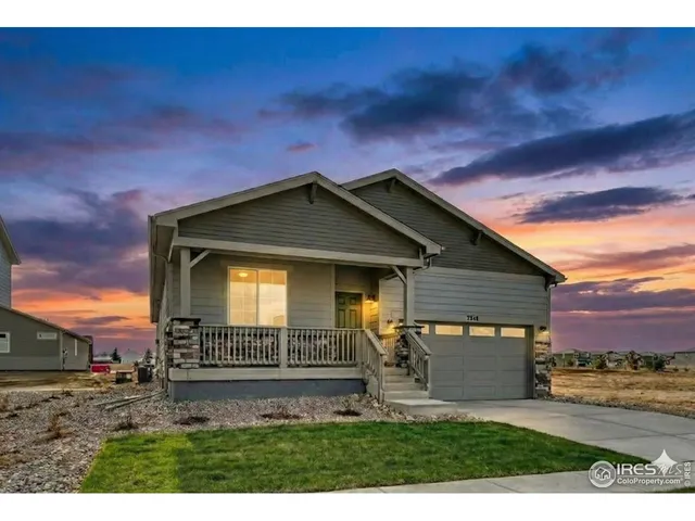 a house with yard in front of it
