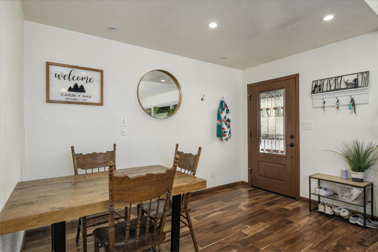 3640 Omo Ranch Road Somerset, CA 95684 - Photo 10 of 57 a view of a dining room with furniture window and wooden floor
