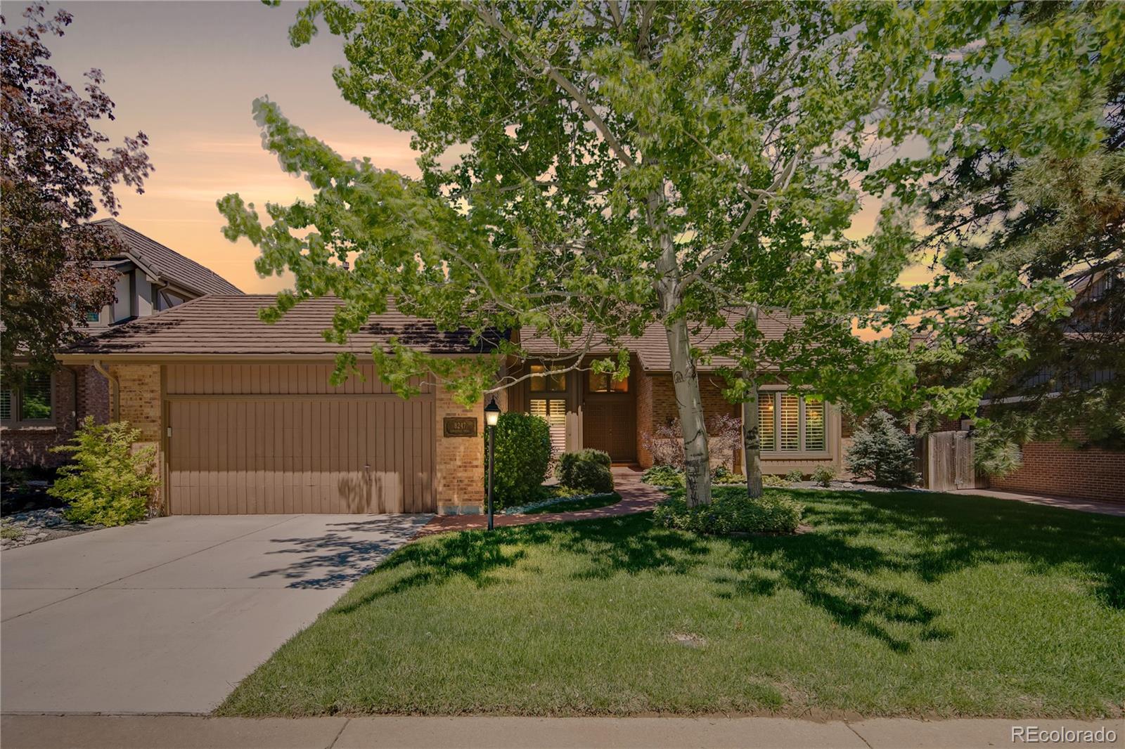 8247 Lodgepole Trail Lone Tree, CO 80124 - Photo 2 of 35 front view of house with a yard