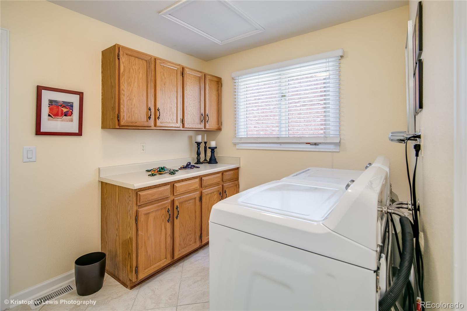 8247 Lodgepole Trail Lone Tree, CO 80124 - Photo 23 of 35 a utility room with dryer and washer