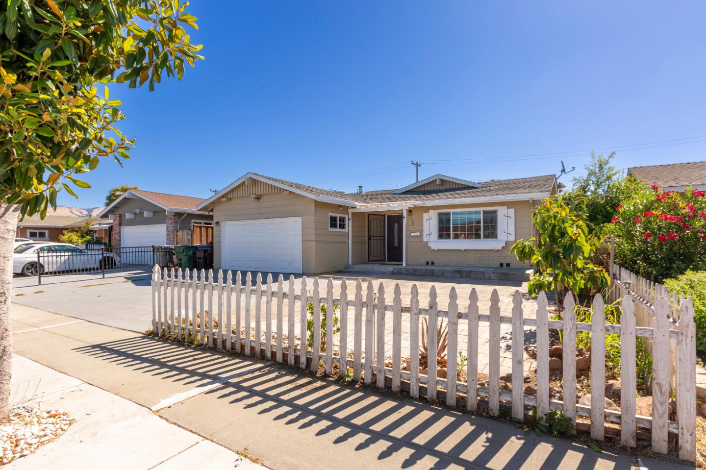 1648 Tierra Buena Drive San Jose, CA 95121 - Photo 1 of 1 a front view of a house with a garden