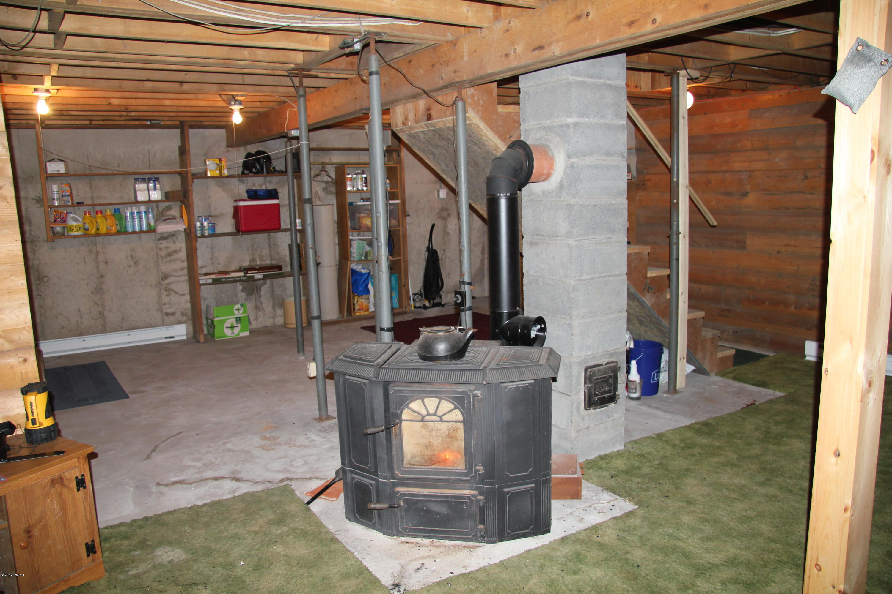300 Highland Road Pleasant Mount, PA 18453 - Photo 20 of 38 Coal stove