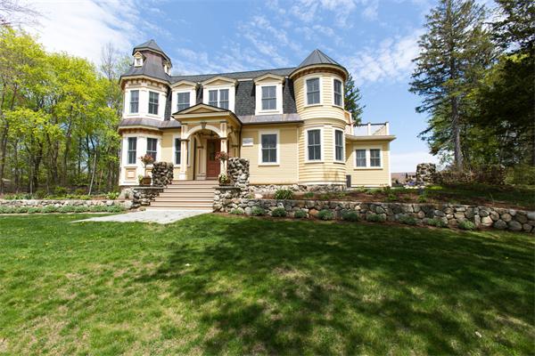 245 Glen Road Weston, MA 02493 - Photo 1 of 26 a front view of a house with a yard