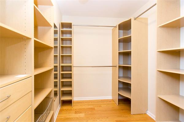 245 Glen Road Weston, MA 02493 - Photo 22 of 26 a view of walk in closet with empty racks