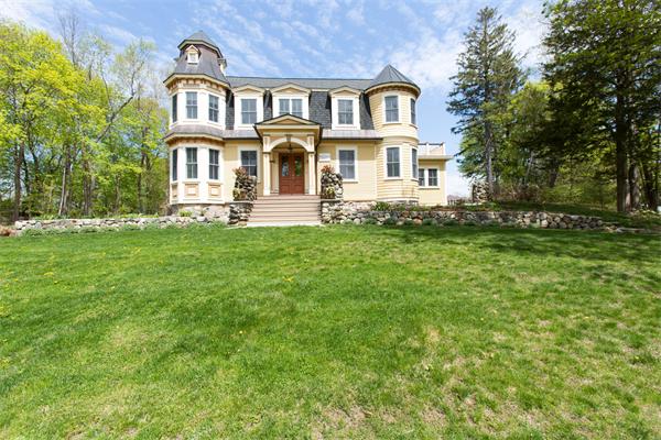 245 Glen Road Weston, MA 02493 - Photo 25 of 26 a front view of a house with a yard