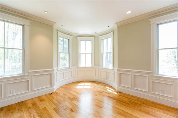 245 Glen Road Weston, MA 02493 - Photo 4 of 26 a view of an empty room with a window