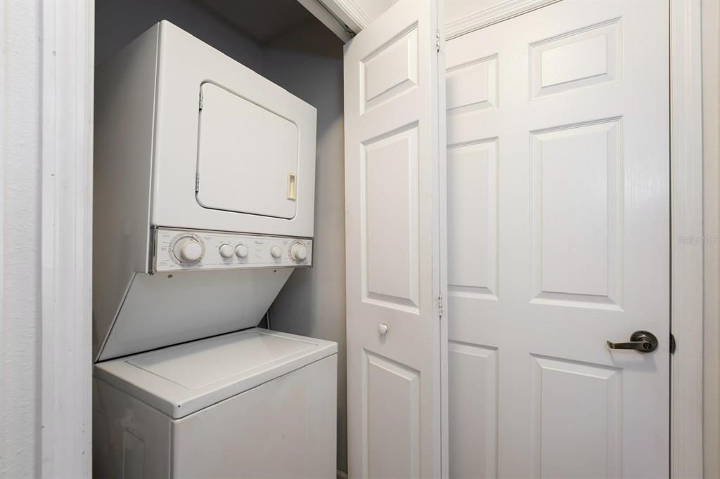 8763 Worldquest Boulevard, Unit 5406 Orlando, FL 32821 - Photo 22 of 25 a view of washer and dryer
