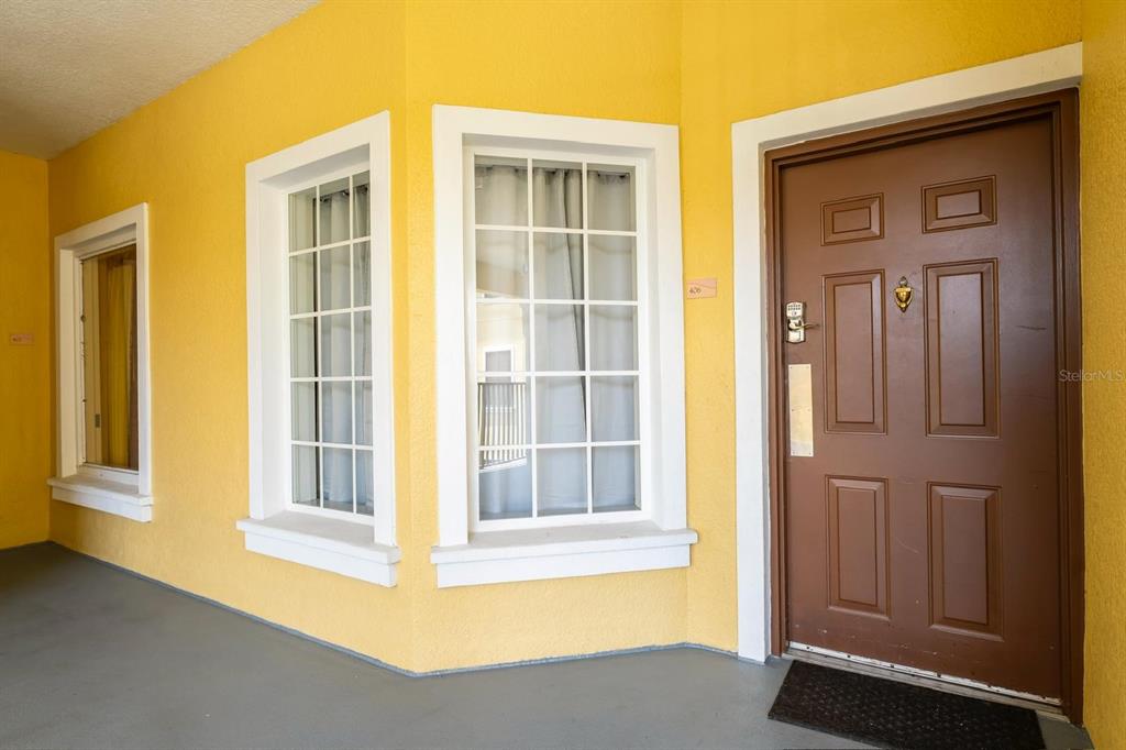 8763 Worldquest Boulevard, Unit 5406 Orlando, FL 32821 - Photo 4 of 25 a view of front door of a house