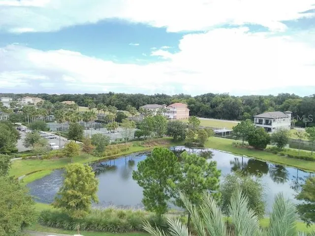 a view of lake with green space