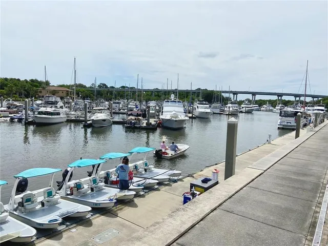 a group of boats are docked in a harbor