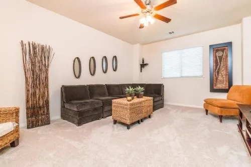 a living room with furniture and a window