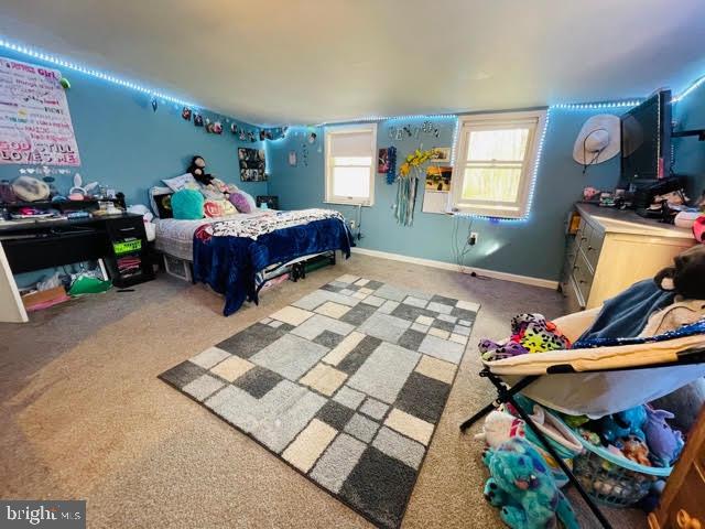 9 View Road Perkiomenville, PA 18074 - Photo 12 of 18 a bedroom with furniture and a flat screen tv