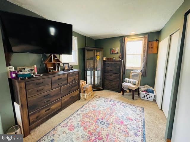 9 View Road Perkiomenville, PA 18074 - Photo 14 of 18 a room with furniture and a flat screen tv