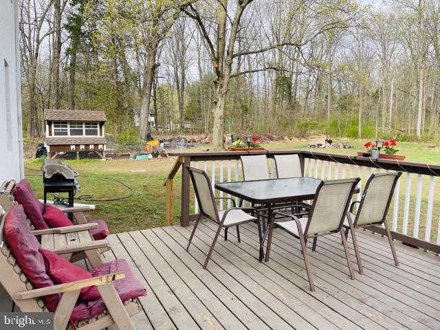 9 View Road Perkiomenville, PA 18074 - Photo 15 of 18 a view of a chairs and table on the wooden floor