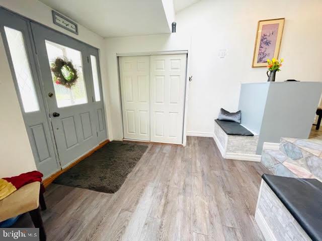 9 View Road Perkiomenville, PA 18074 - Photo 3 of 18 a view of a bedroom with wooden floor and bed