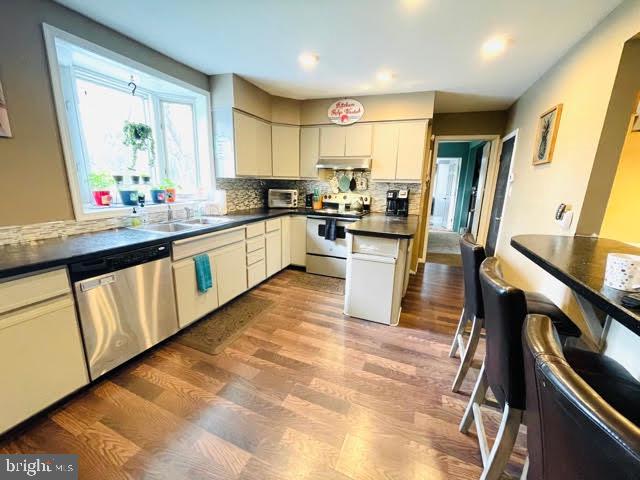 9 View Road Perkiomenville, PA 18074 - Photo 5 of 18 a kitchen with wooden cabinets and sink