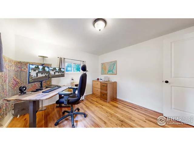 a bathroom with a sink a mirror and a shower