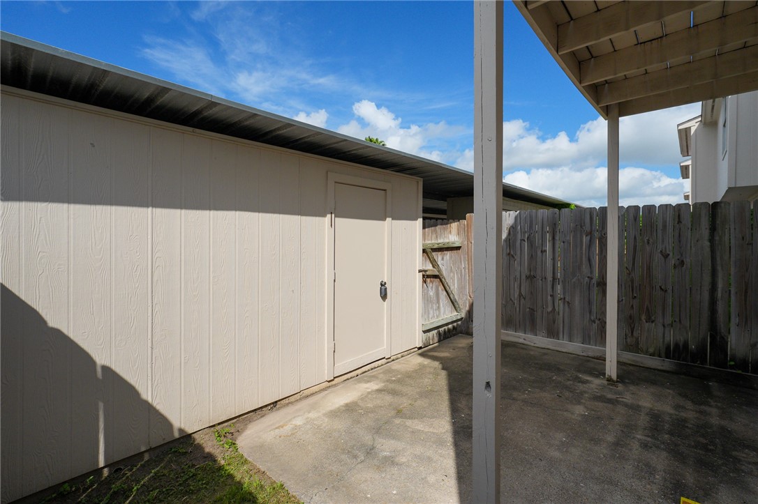 6702 Everhart Road, Unit U104 Corpus Christi, TX 78413 - Photo 21 of 25 Fenced in Private patio