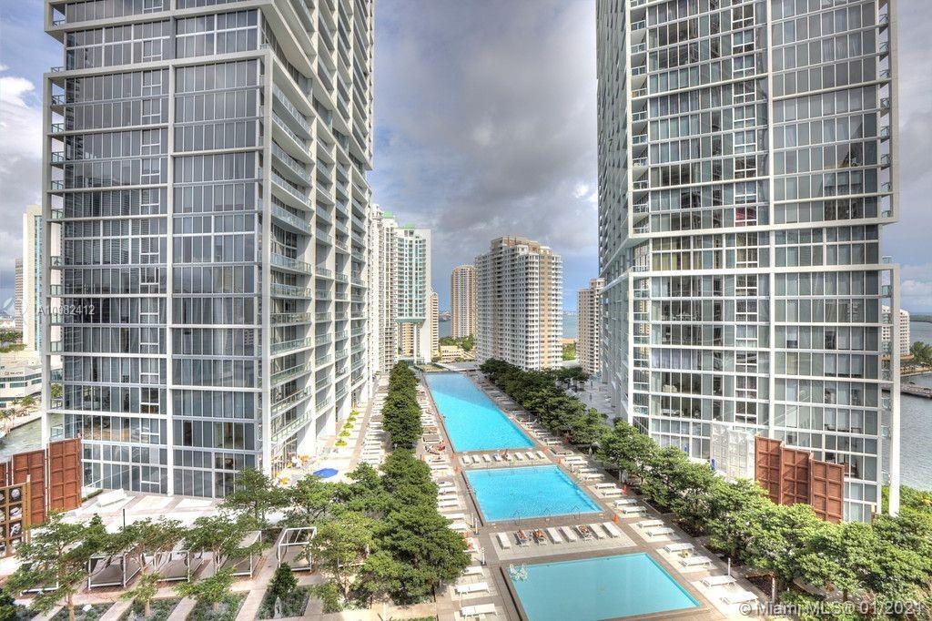 a view of a city with tall buildings