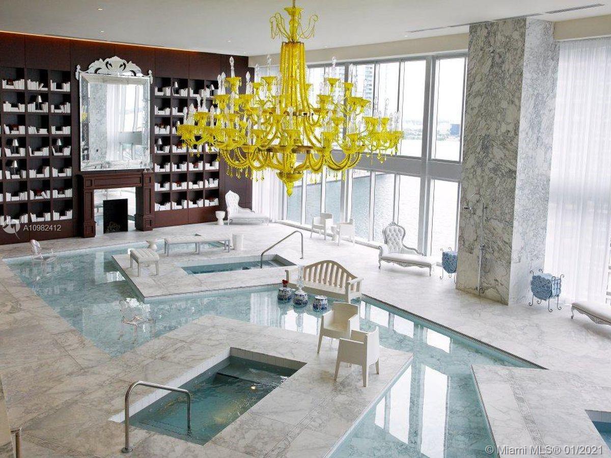 475 Brickell Avenue, Unit 4812 Miami, FL 33131 - Photo 23 of 26 a living room filled with furniture