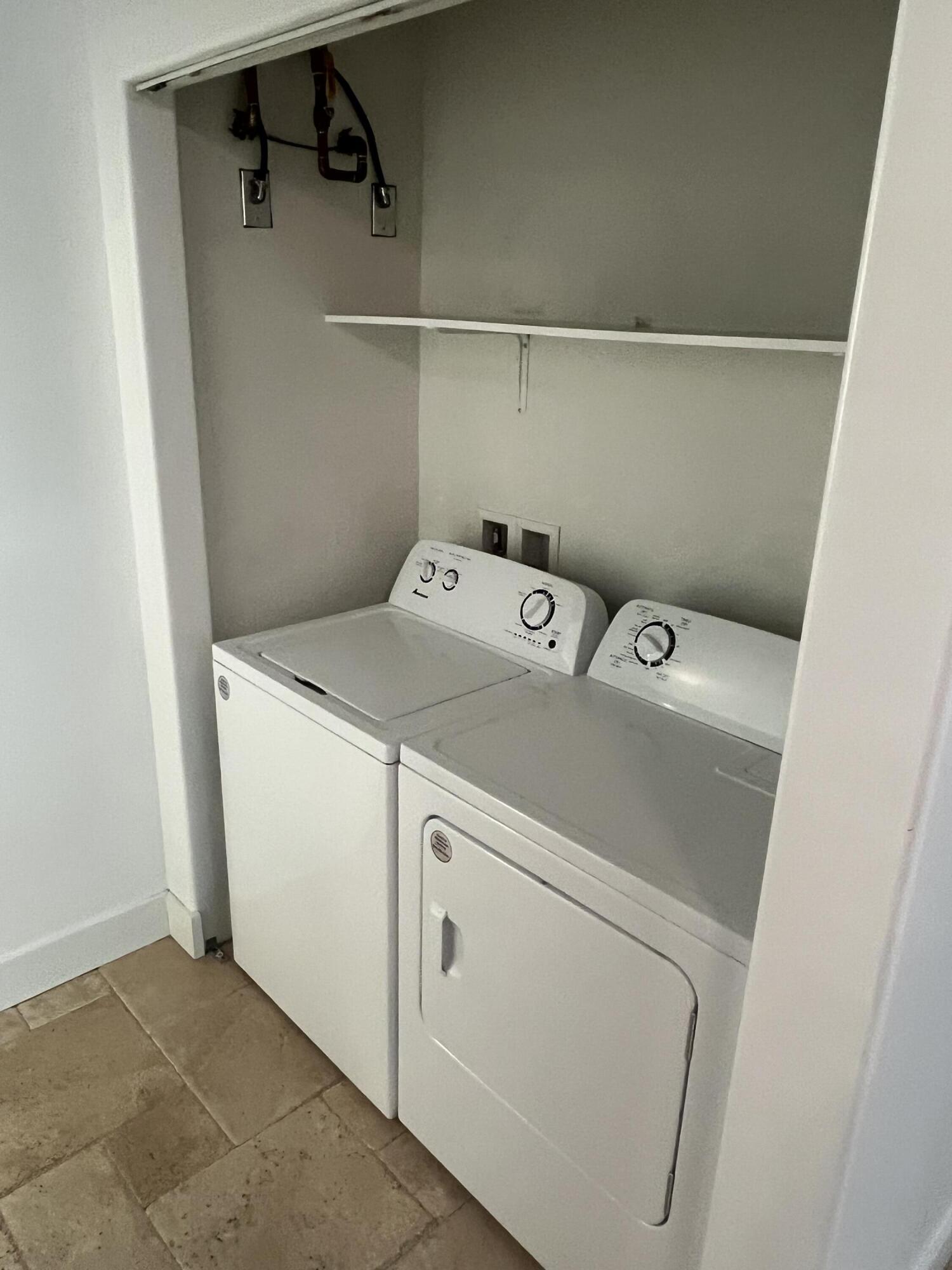 639 Cabrera Street Key Largo, FL 33037 - Photo 19 of 24 a utility room with dryer and washer