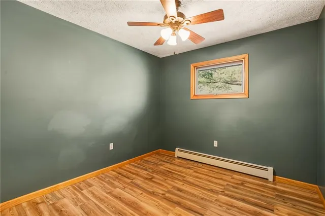 a view of a room with a fan