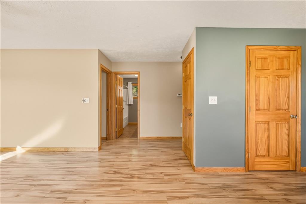 1303 Faidley Road Garrett, PA 15542 - Photo 2 of 43 a view of a livingroom with wooden floor and closet area
