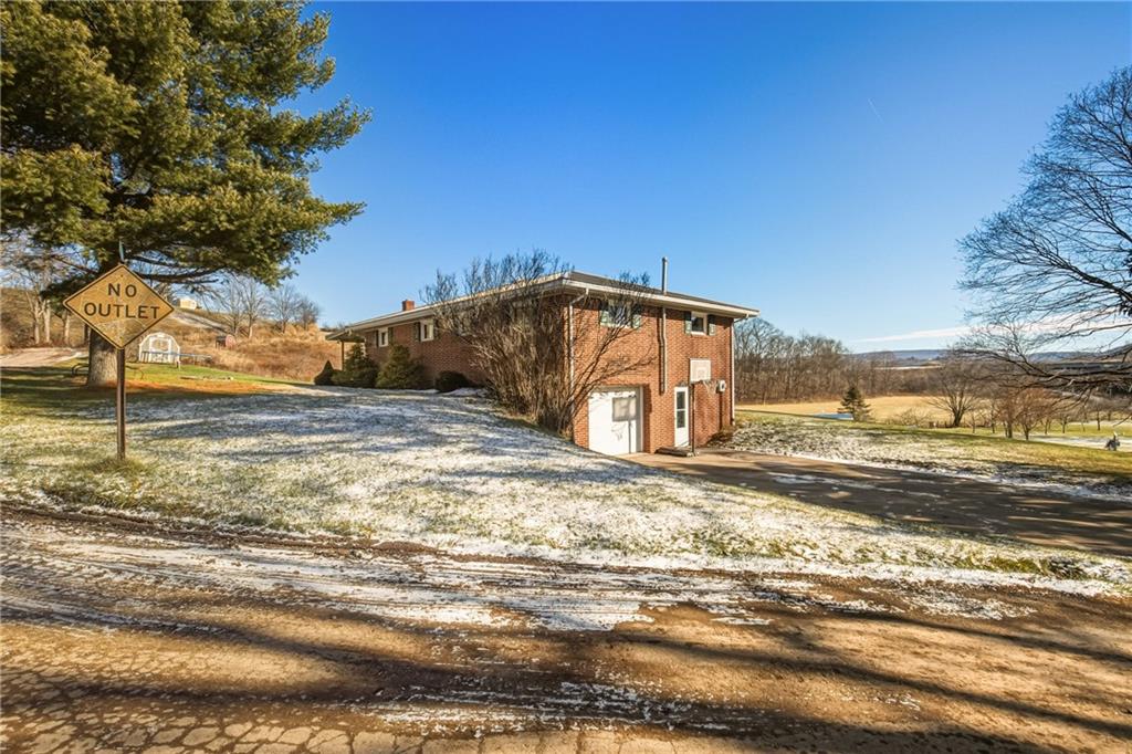1303 Faidley Road Garrett, PA 15542 - Photo 26 of 43 a view of a house with a yard