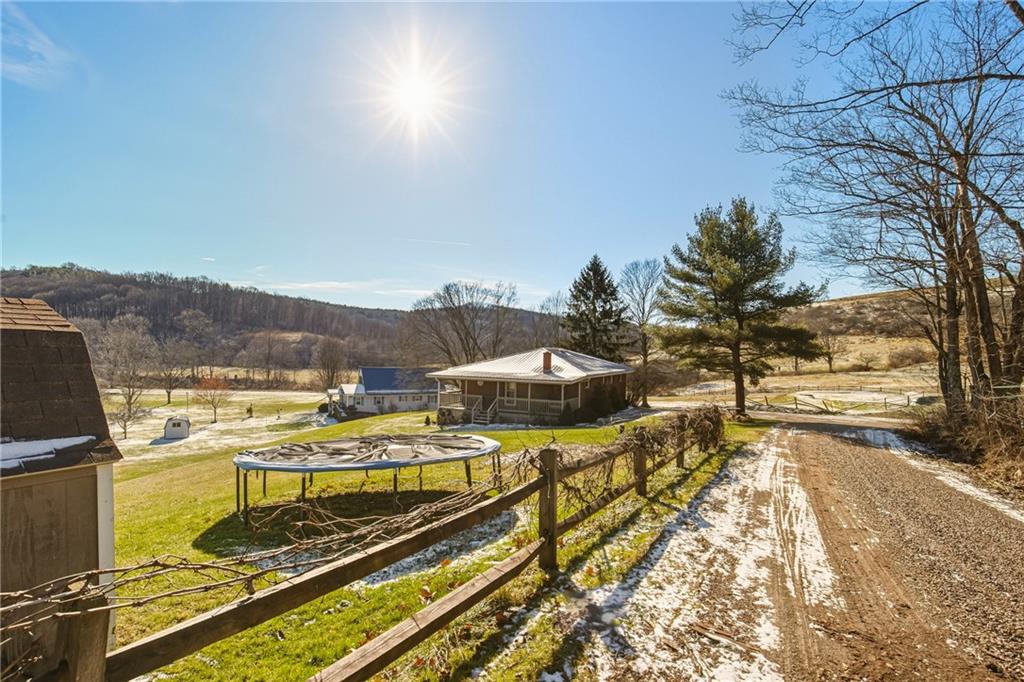 1303 Faidley Road Garrett, PA 15542 - Photo 28 of 43 a view of a swimming pool with a yard