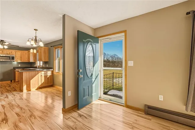 a view of a kitchen from the hallway