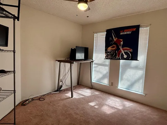 a bedroom with a bed and a walk in closet