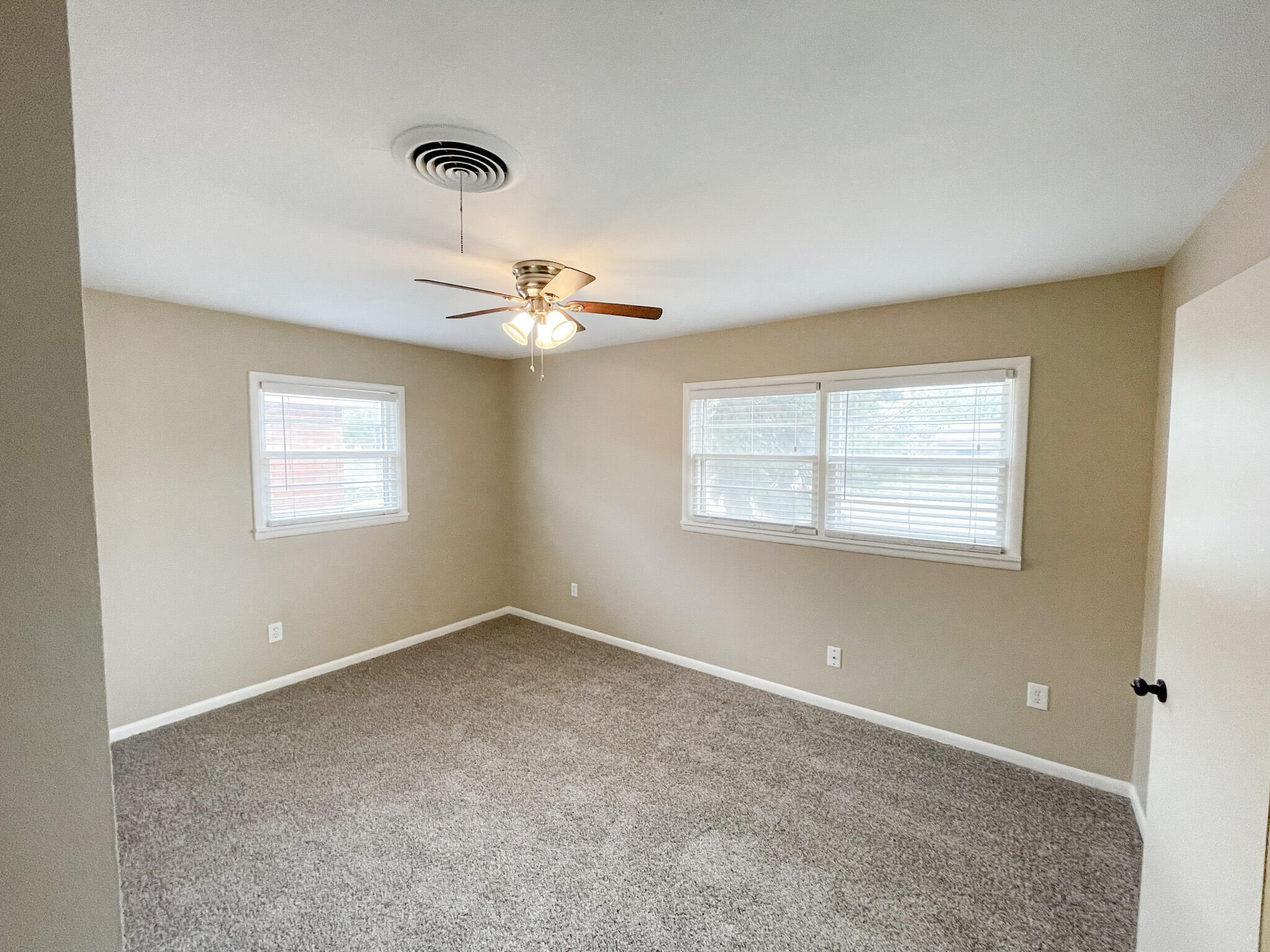 5424 23rd Street Lubbock, TX 79407 - Photo 6 of 11 an empty room with a window