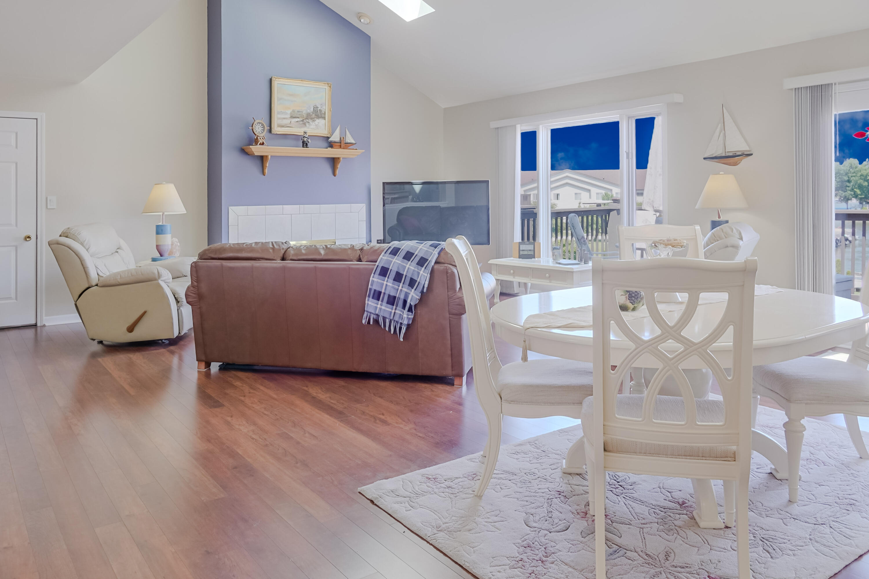 5065 Spinnaker Lane, Unit D Crown Point, IN 46307 - Photo 11 of 42 a living room with furniture and a wooden floor
