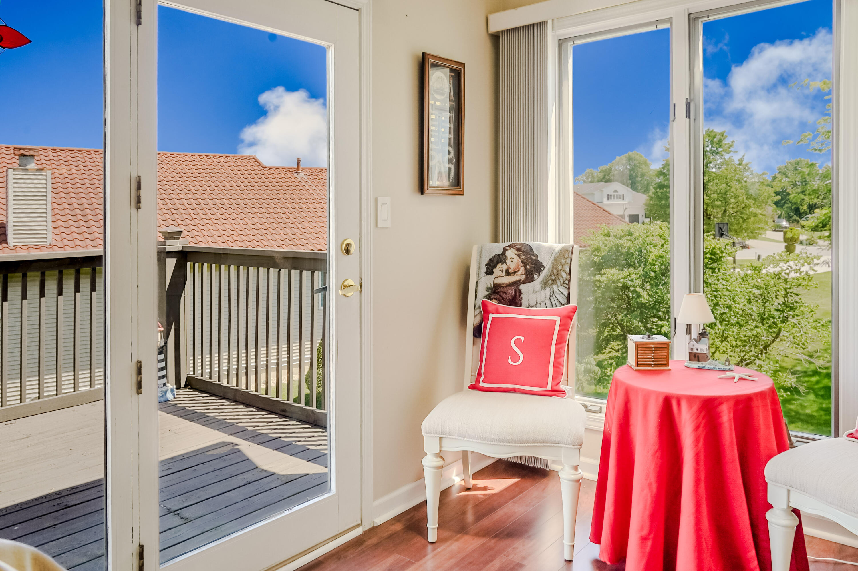 5065 Spinnaker Lane, Unit D Crown Point, IN 46307 - Photo 17 of 42 a view of a bedroom with wooden floor and bed