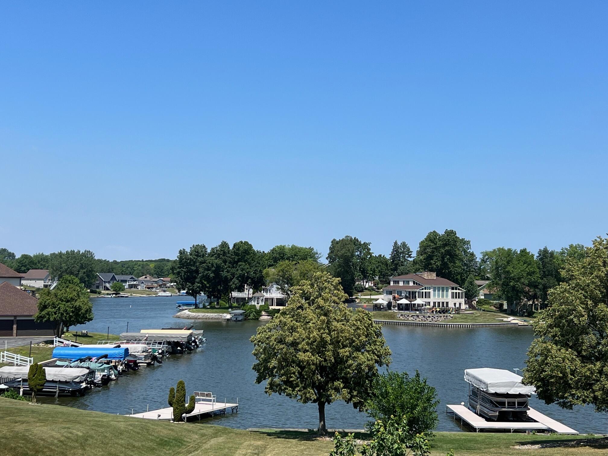 5065 Spinnaker Lane, Unit D Crown Point, IN 46307 - Photo 4 of 42 a view of lake and boats