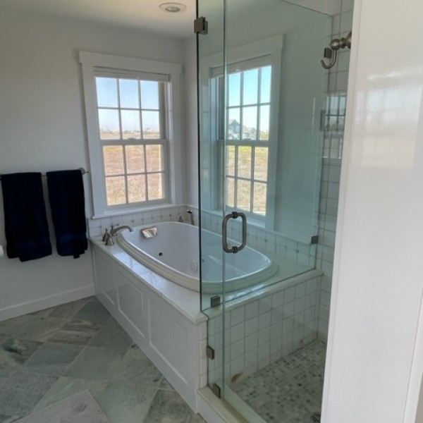22 Sheep Pond Road Nantucket, MA 02554 - Photo 21 of 27 a bathroom with a bathtub and shower