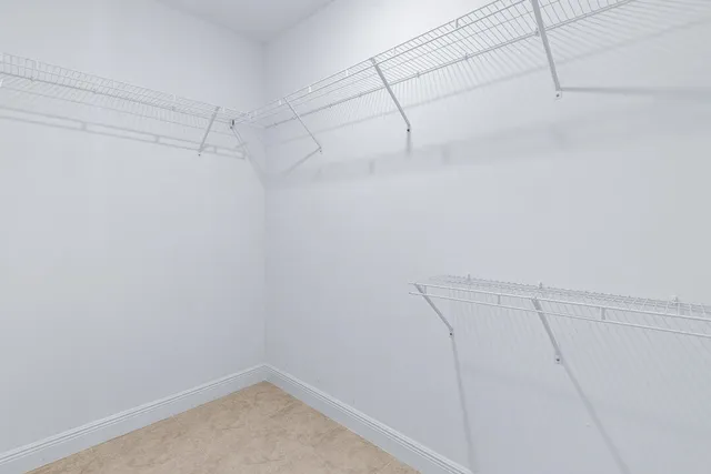 a view of a room with racks on the wall