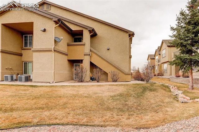 a view of a house with a snow on the road