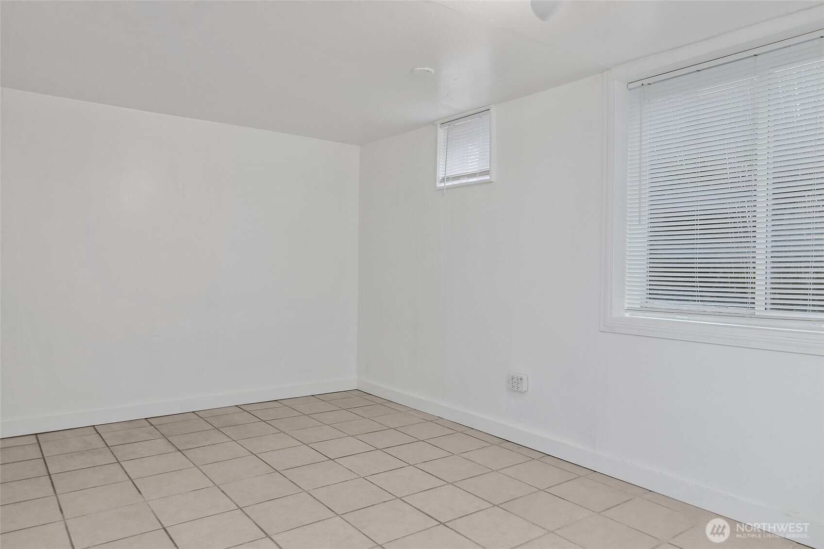 2209 East Roanoke Street Seattle, WA 98112 - Photo 18 of 31 a view of an empty room