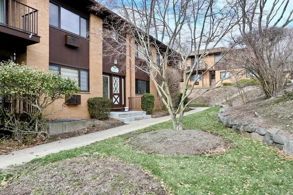 a view of a building with a yard