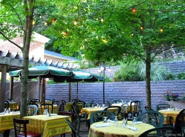 a garden view with a seating space